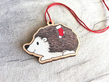 Load image into Gallery viewer, Hedgehog Christmas decoration. Hedgehog and stocking, small wooden, ethically sourced wood. Cute Christmas tree ornament