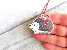 Load image into Gallery viewer, Hedgehog Christmas decoration. Hedgehog and stocking, small wooden, ethically sourced wood. Cute Christmas tree ornament