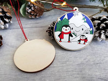 Load image into Gallery viewer, Penguin Christmas decoration. Snowy mountains small wooden ornament. Ethically sourced wood. Cute penguins Christmas tree ornaments.
