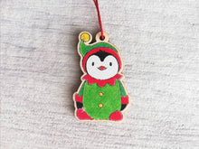 Load image into Gallery viewer, Penguin elf Christmas decoration. Small wooden elf penguin. Ethically sourced wood. Cute Christmas tree ornament
