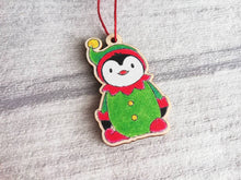 Load image into Gallery viewer, Penguin elf Christmas decoration. Small wooden elf penguin. Ethically sourced wood. Cute Christmas tree ornament
