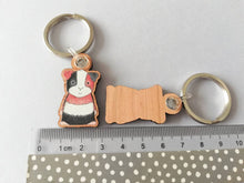 Load image into Gallery viewer, Guinea pig keyring, wooden cavy key fob, tri colour guinea pig key chain, wood bag charm, responsibly resourced wood