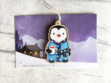 Load image into Gallery viewer, Penguin dressing gown Christmas decoration, eco friendly, ethically sourced wood, cute little tag, waiting for Santa
