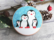 Load image into Gallery viewer, Penguin family decoration. Wooden Christmas ornament, penguins in the snow, eco friendly wood