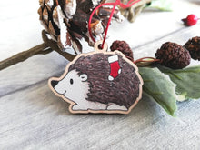 Load image into Gallery viewer, Hedgehog Christmas decoration. Hedgehog and stocking, small wooden, ethically sourced wood. Cute Christmas tree ornament