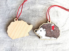 Load image into Gallery viewer, Hedgehog Christmas decoration. Hedgehog and stocking, small wooden, ethically sourced wood. Cute Christmas tree ornament