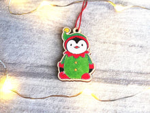 Load image into Gallery viewer, Penguin elf Christmas decoration. Small wooden elf penguin. Ethically sourced wood. Cute Christmas tree ornament