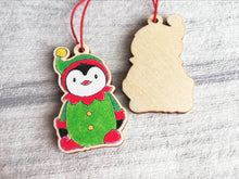 Load image into Gallery viewer, Penguin elf Christmas decoration. Small wooden elf penguin. Ethically sourced wood. Cute Christmas tree ornament