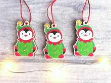 Load image into Gallery viewer, Penguin elf Christmas decoration. Small wooden elf penguin. Ethically sourced wood. Cute Christmas tree ornament