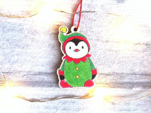 Load image into Gallery viewer, Penguin elf Christmas decoration. Small wooden elf penguin. Ethically sourced wood. Cute Christmas tree ornament