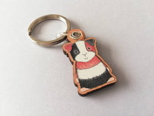 Load image into Gallery viewer, Guinea pig keyring, wooden cavy key fob, tri colour guinea pig key chain, wood bag charm, responsibly resourced wood