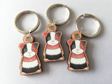 Load image into Gallery viewer, Guinea pig keyring, wooden cavy key fob, tri colour guinea pig key chain, wood bag charm, responsibly resourced wood