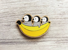 Load image into Gallery viewer, Penguin chicks and banana wooden fridge magnet
