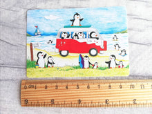 Load image into Gallery viewer, Penguins at the beach, summer penguin vinyl sticker, seaside, surfing, camper, swimming and ice cream