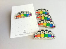 Load image into Gallery viewer, Rainbow penguin pin, recycled acrylic, penguin line up, rainbow jumpers