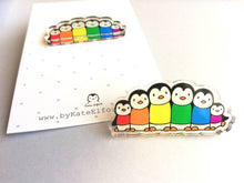 Load image into Gallery viewer, Rainbow penguin pin, recycled acrylic, penguin line up, rainbow jumpers