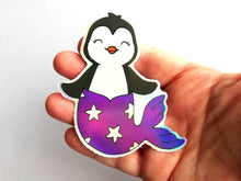Load image into Gallery viewer, Penguin mermaid holographic vinyl sticker, purple rainbow mermaid sticker