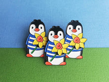 Load image into Gallery viewer, Penguin and daffodil enamel pin, penguin brooch. Boo the penguin spring flower pin
