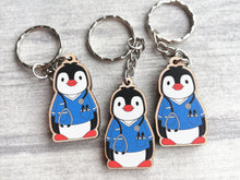 Load image into Gallery viewer, Nurse penguin keyring, nursing wooden key fob, eco friendly wood, Boo the penguin key chain, bag charm
