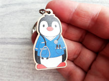 Load image into Gallery viewer, Nurse penguin keyring, nursing wooden key fob, eco friendly wood, Boo the penguin key chain, bag charm