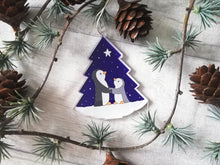 Load image into Gallery viewer, Penguin and star decoration. Eco friendly, purple recycled acrylic Christmas ornament, penguins in the snow