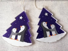 Load image into Gallery viewer, Penguin and star decoration. Eco friendly, purple recycled acrylic Christmas ornament, penguins in the snow