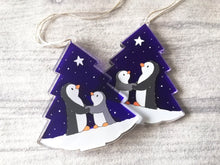 Load image into Gallery viewer, Penguin and star decoration. Eco friendly, purple recycled acrylic Christmas ornament, penguins in the snow