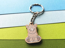 Load image into Gallery viewer, Tiny rhino keyring, mini rhinoceros wooden key fob, eco friendly wood