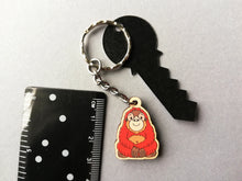Load image into Gallery viewer, Mini optimistic orangutan keyring, tiny wooden key fob, eco friendly wood, bag charm