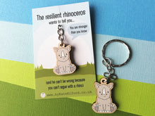 Load image into Gallery viewer, Mini resilient rhino keyring, mini wooden rhinoceros key fob, eco friendly wood, key chain, positive gift