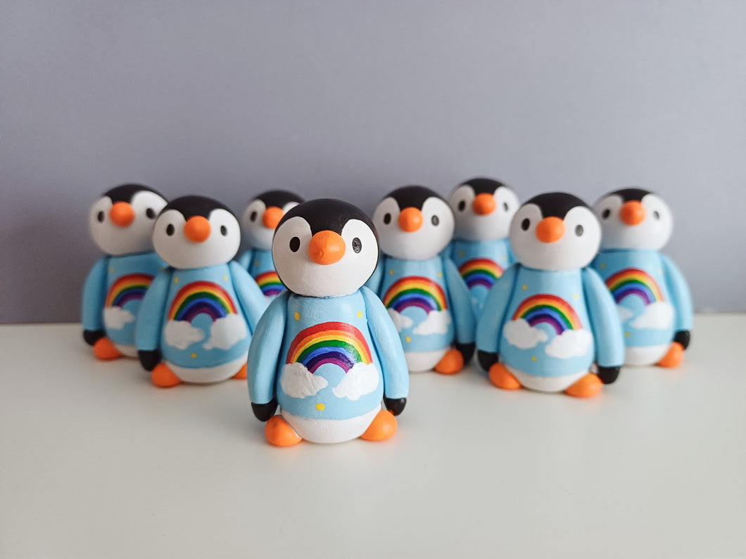 Penguin in a rainbow jumper