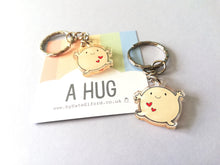 Load image into Gallery viewer, A hug keyring, cute positive mini key fob, friendship, post a hug, supportive, recycled acrylic
