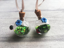 Load image into Gallery viewer, Tiny pottery ladybird and glass bauble
