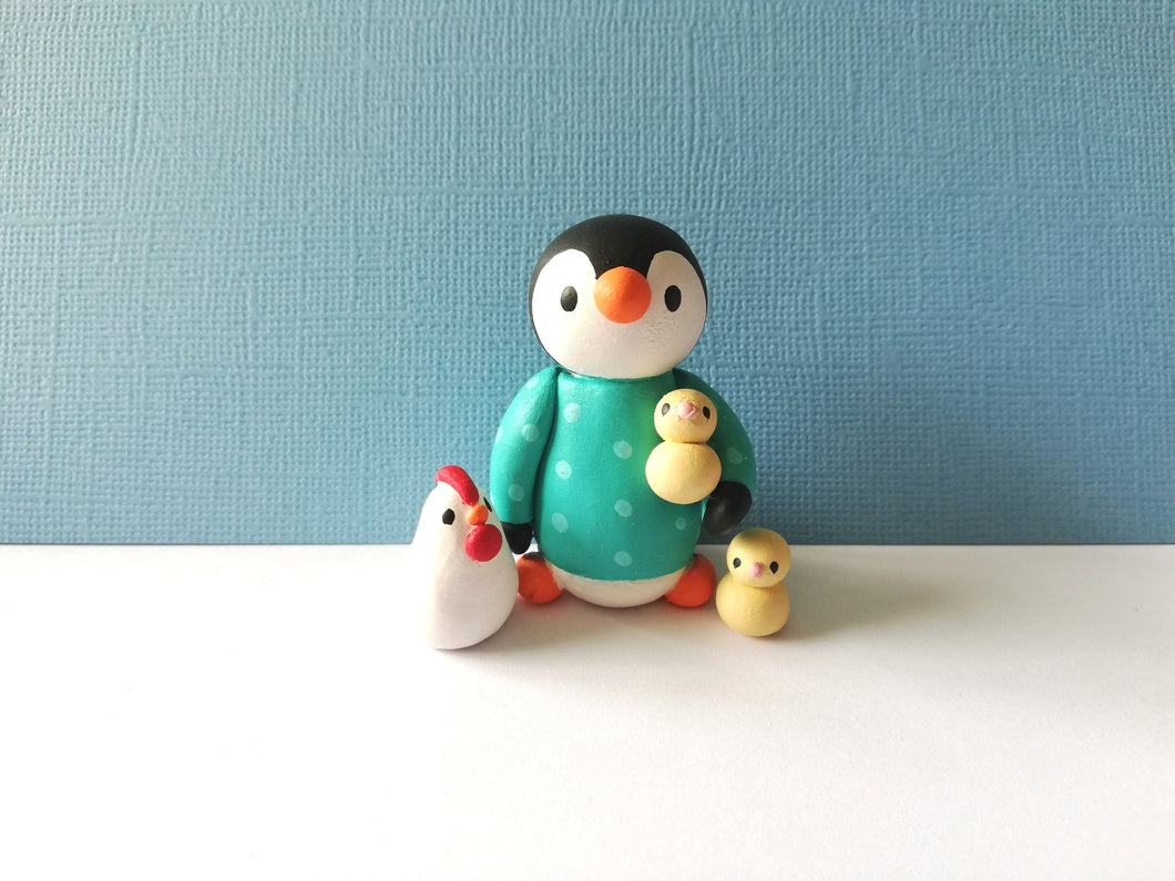 Penguin, chicken and chicks