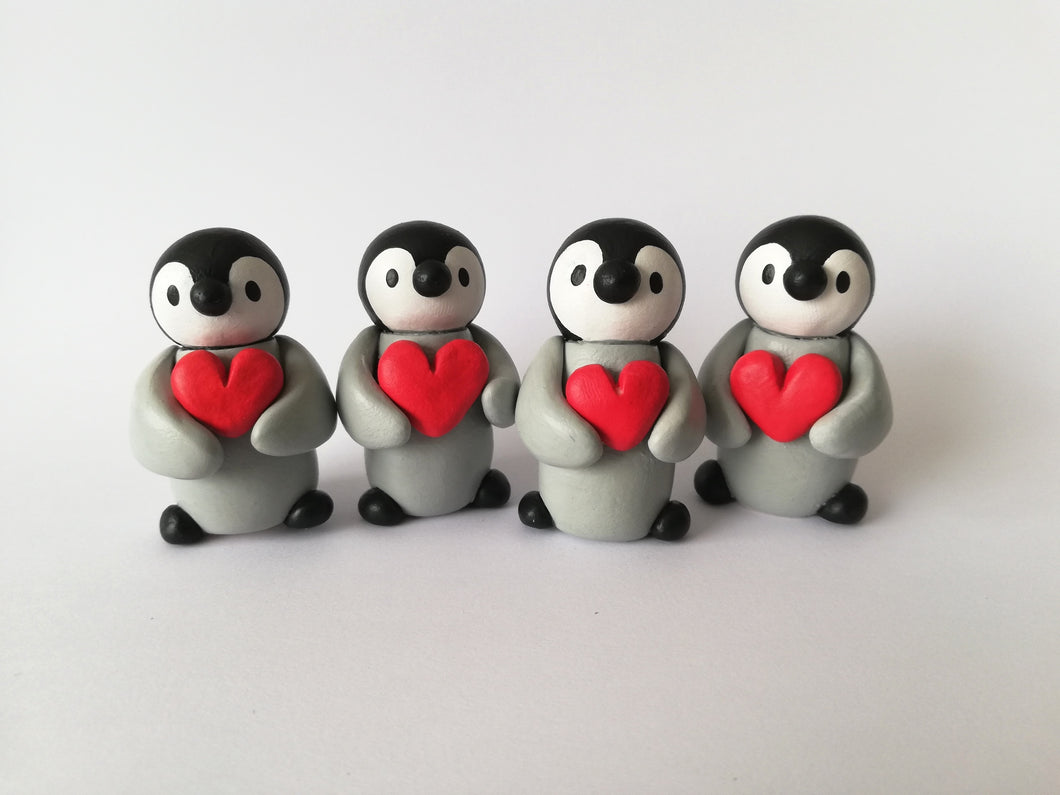 Penguin chick and heart