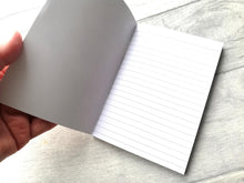 Load image into Gallery viewer, Inside of a lined A6 notebook
