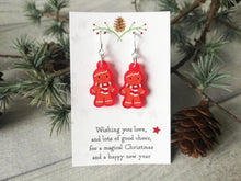 Load image into Gallery viewer, Christmas earrings, Red frosted acrylic, cute, sterling silver hooks, Christmas gingerbread men, snowmen or penguins. Christmas gift
