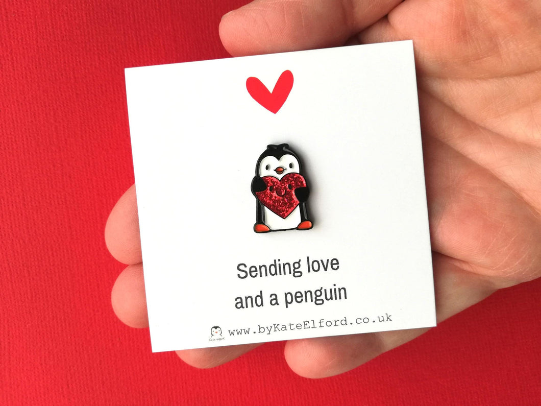 Little penguin and red or pink glitter heart pin. Cute penguin enamel pin. Sending love and a penguin