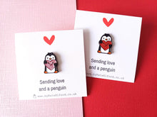 Load image into Gallery viewer, Little penguin and red or pink glitter heart pin. Cute penguin enamel pin. Sending love and a penguin
