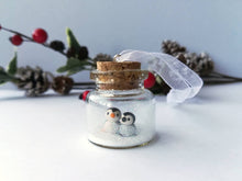 Load image into Gallery viewer, Miniature penguin Christmas decoration. Little pottery penguins and chick in a glass bottle. Christmas penguin mini ornament, mothers day
