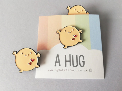 A hug enamel pin, positive happy gift