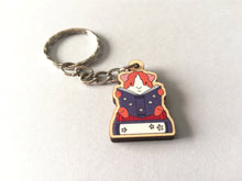 Load image into Gallery viewer, Mini guinea pig reading a book keyring, small wooden key fob, ethically sourced wood, guinea pig and books key chain, bag charm
