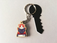 Load image into Gallery viewer, Mini guinea pig reading a book keyring, small wooden key fob, ethically sourced wood, guinea pig and books key chain, bag charm
