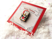 Load image into Gallery viewer, Christmas penguin wooden pin brooch, Cute little penguin badge, holding a Christmas stocking, eco friendly wood
