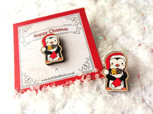 Load image into Gallery viewer, Christmas penguin wooden pin brooch, Cute little penguin badge, holding a Christmas stocking, eco friendly wood
