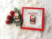 Load image into Gallery viewer, Christmas penguin wooden pin brooch, Cute little penguin badge, holding a Christmas stocking, eco friendly wood
