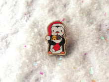 Load image into Gallery viewer, Christmas penguin wooden pin brooch, Cute little penguin badge, holding a Christmas stocking, eco friendly wood
