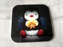 Load image into Gallery viewer, Penguin holding a star coaster
