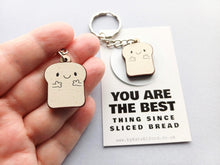 Load image into Gallery viewer, Sliced bread keyring - Positive keyring - Ethically sourced wood - Small wooden keyring - Unique gift idea - Motivational keyring
