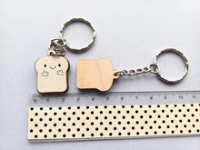 Load image into Gallery viewer, Sliced bread keyring - Positive keyring - Ethically sourced wood - Small wooden keyring - Unique gift idea - Motivational keyring
